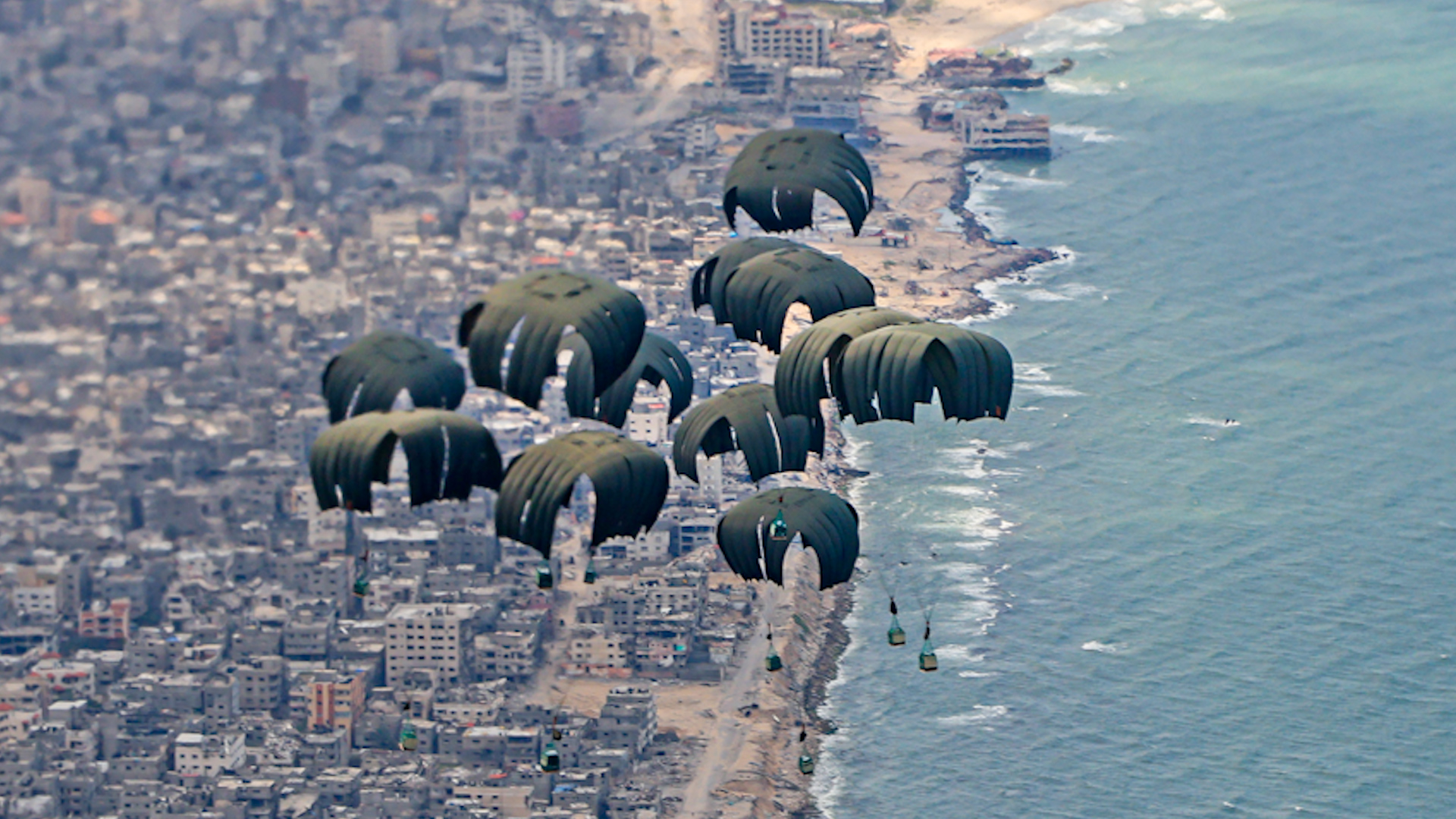 humanitarian aid, seen here being airdropped over Gaza from a RAF A400M aircraft 25032024 CREDIT MOD