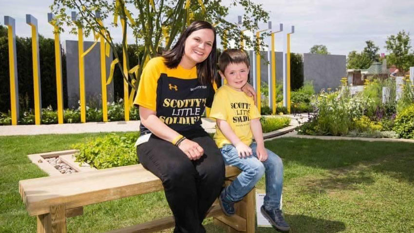 Jack Rigby with Scotty's Little Soldiers founder Nikki Scott CREDIT Scotty's Little Soldiers