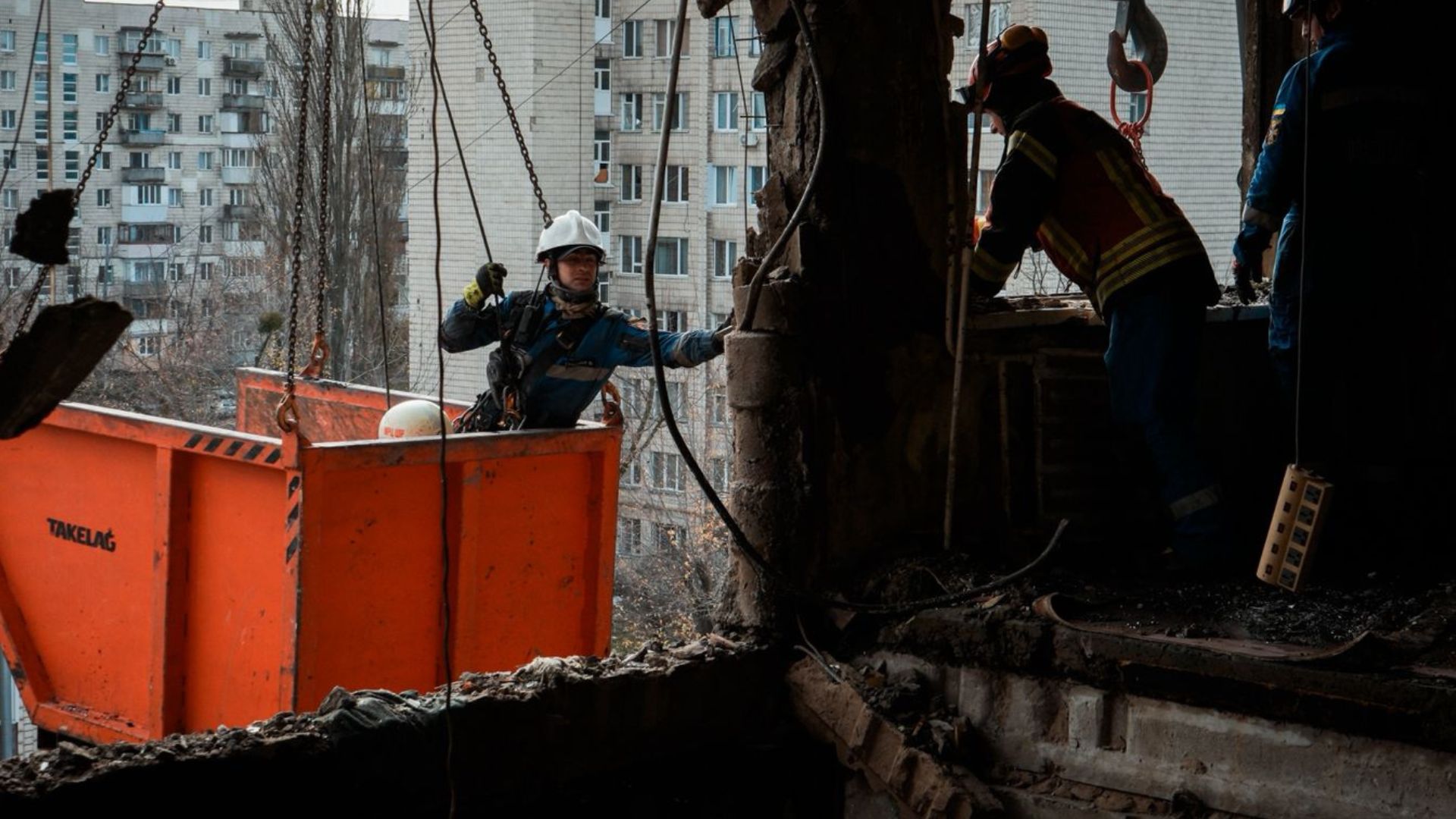 Falling debris and fires damaged multiple high-rise apartment buildings, a hospital, school and administrative buildings, according to emergency services