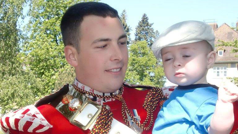 Lee Rigby in April 2011 with son Jack age 7 months CREDIT Scotty's Little Soldiers
