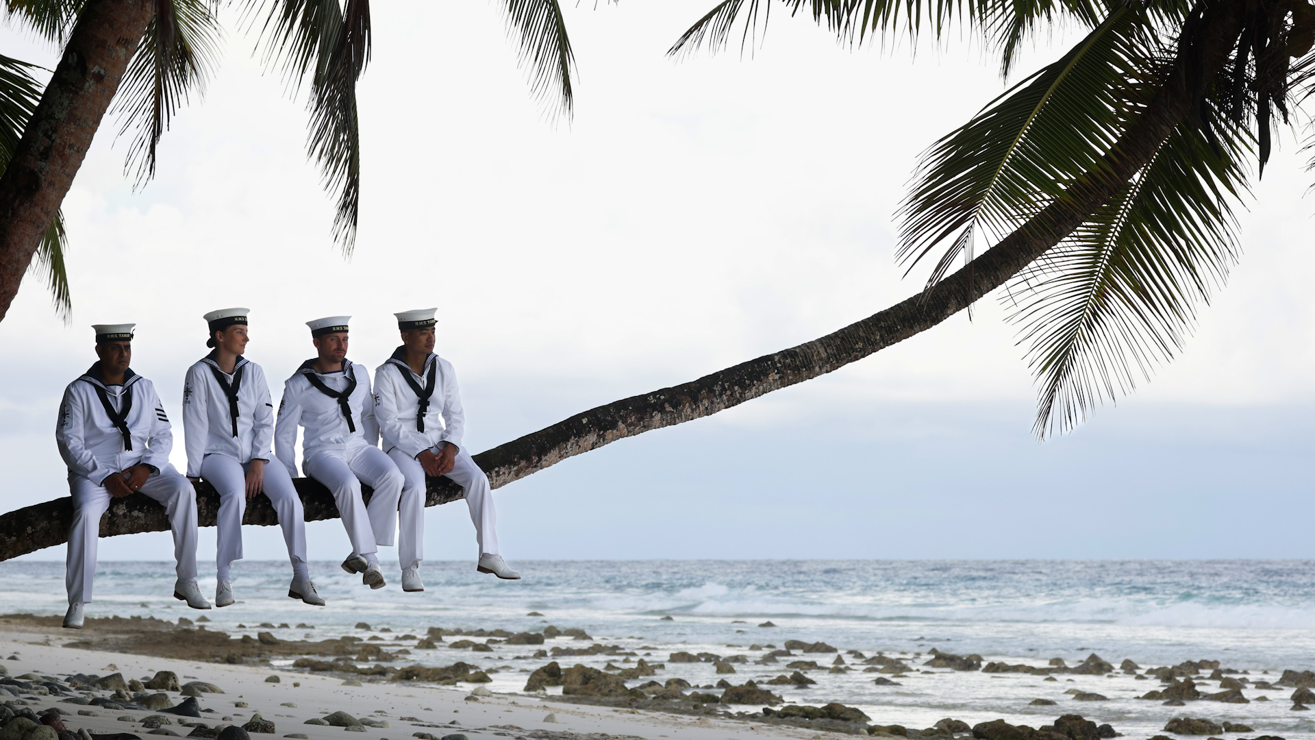 Members of the crew taking in the sun on one of the islands (Picture: Royal Navy).