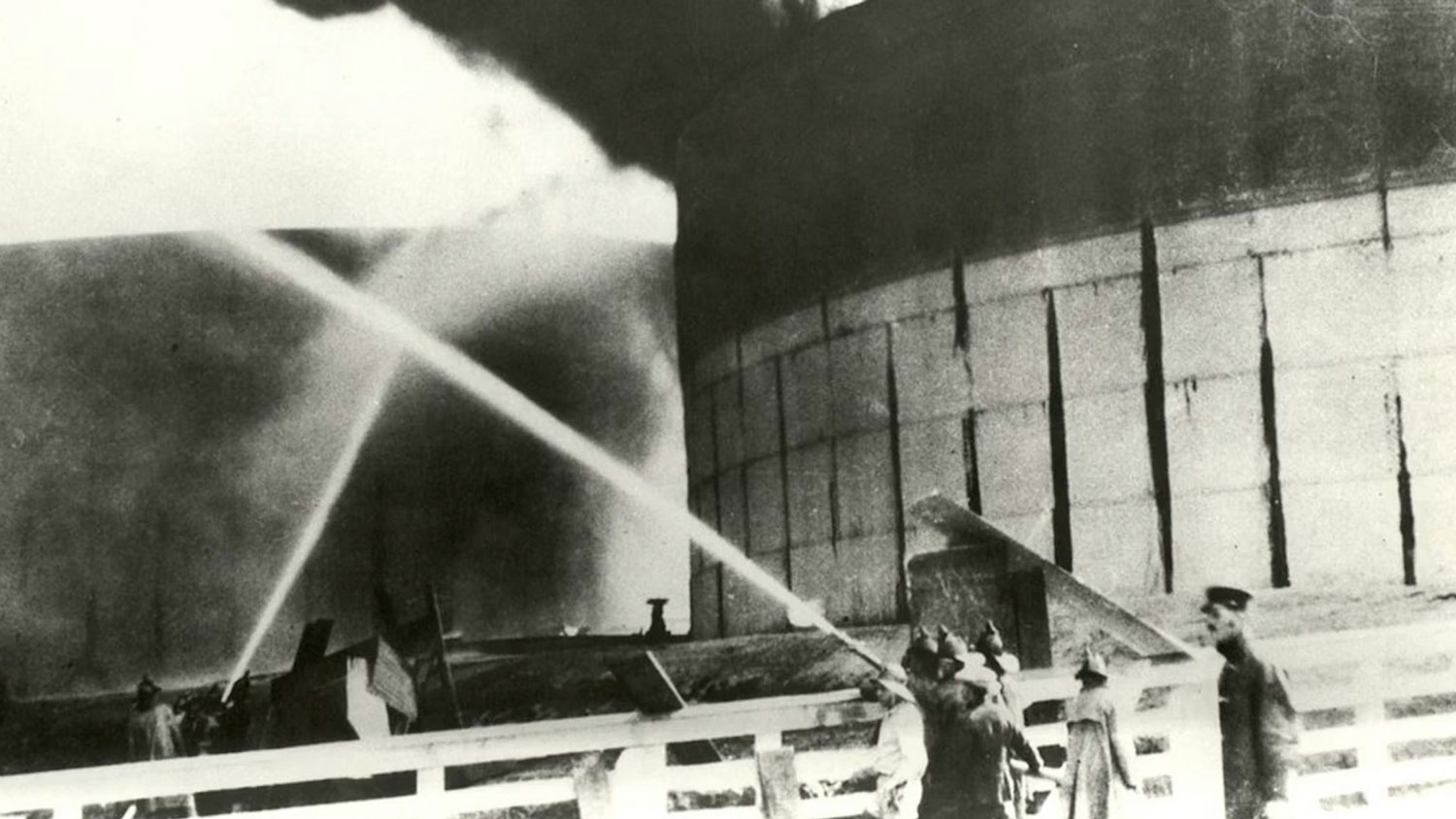 Monterey oil tank fire 14 September 14 1924 hoses pump water towards the fire CREDIT Mayo Hayes O'Donnell Library
