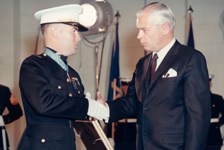Navy Secretary Paul Nitze congratulates Marine Corps Capt. Harvey Barnum Jr. as he receives the Medal of Honor Image ID 160729-N-ZW259-5131C CREDIT US Marine Corps