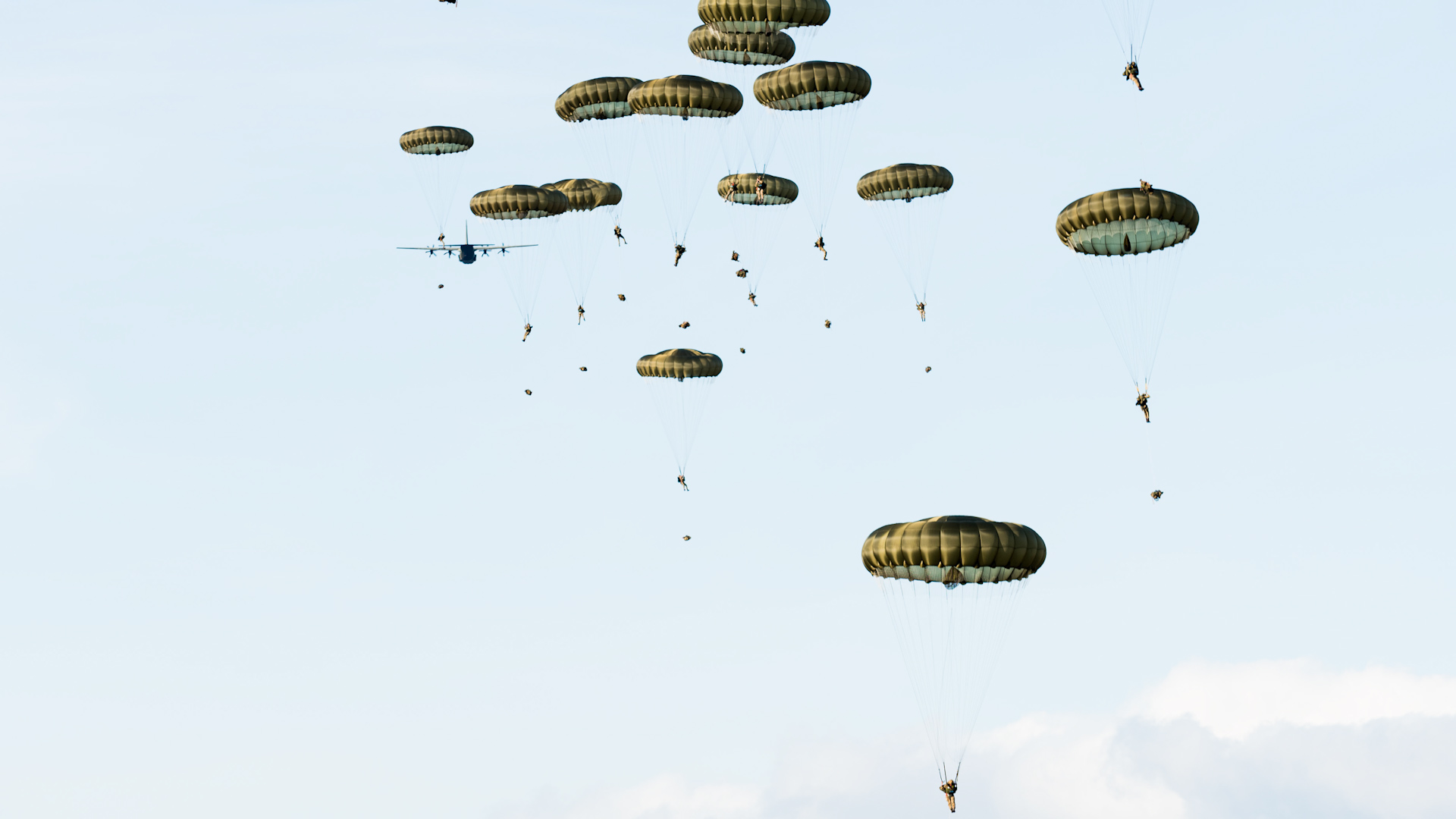 Paratroopers jump out of an RAF C130 Hercules (Picture: British Army).
