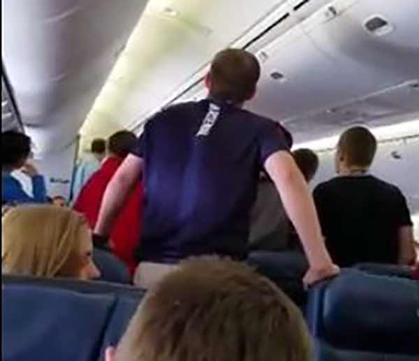 Choir On Plane Sings Tribute To Fallen Soldier