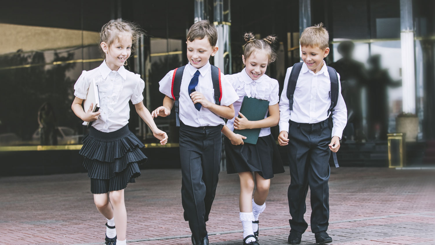 Children School Uniform Playing Running Credit Shutterstock/Matva