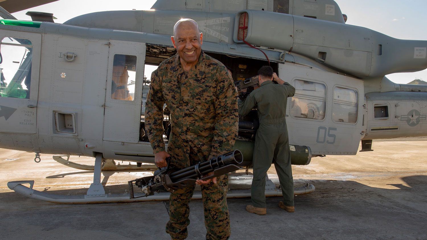 Sgt Maj John L. Canley holds a M124 GAU-17 Gatling gun while visiting Marines in Hawaii on 12 February 2019 CREDIT US Marine Corps