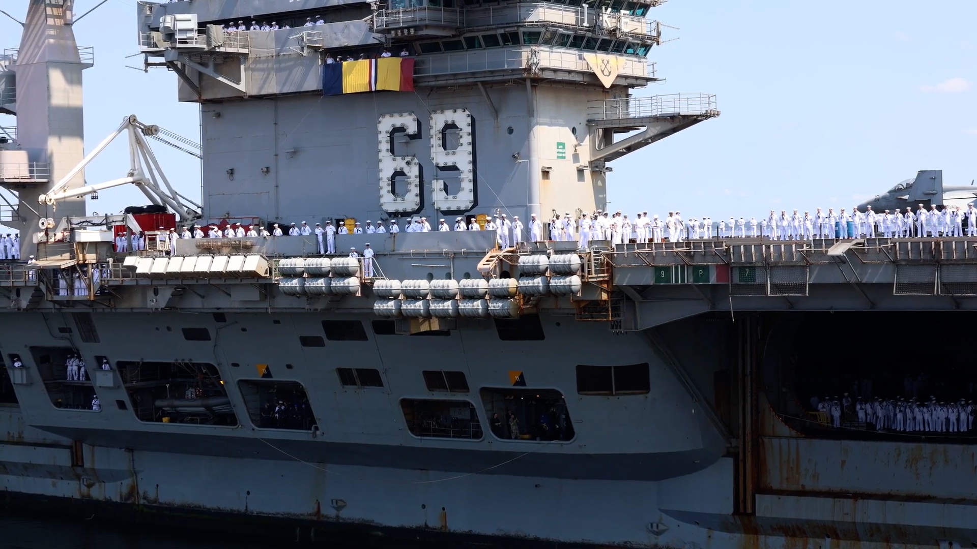 	side_view_of_uss_dwight_d_eisenhower_at_naval_station_norfolk_140724_credit_us_department_of_defense