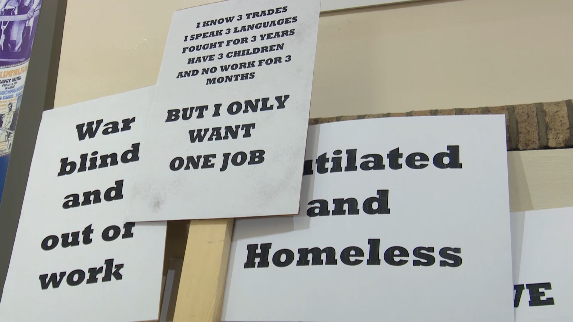 Replica signs have been made, reflecting how soldiers felt after World War I.