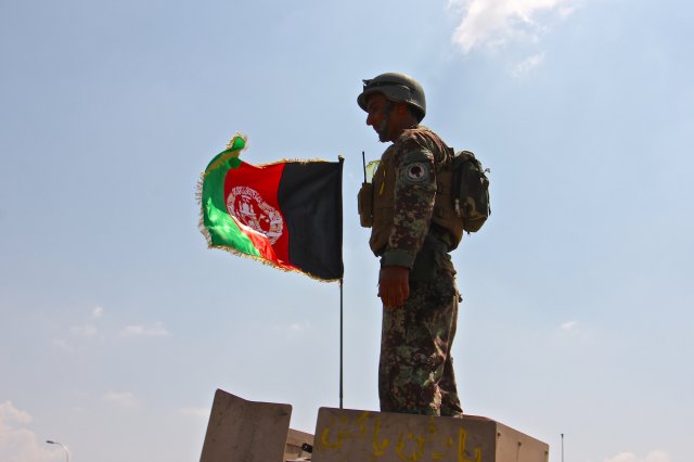 PICTURES: US ARMY // An Afghan National Army soldier from 201 Corps stands in the gunner's turret of an armored vehicle