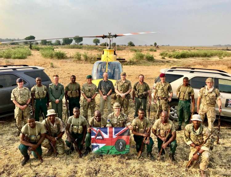 British soldiers teaching rangers anti-poaching tactics in Malawi.