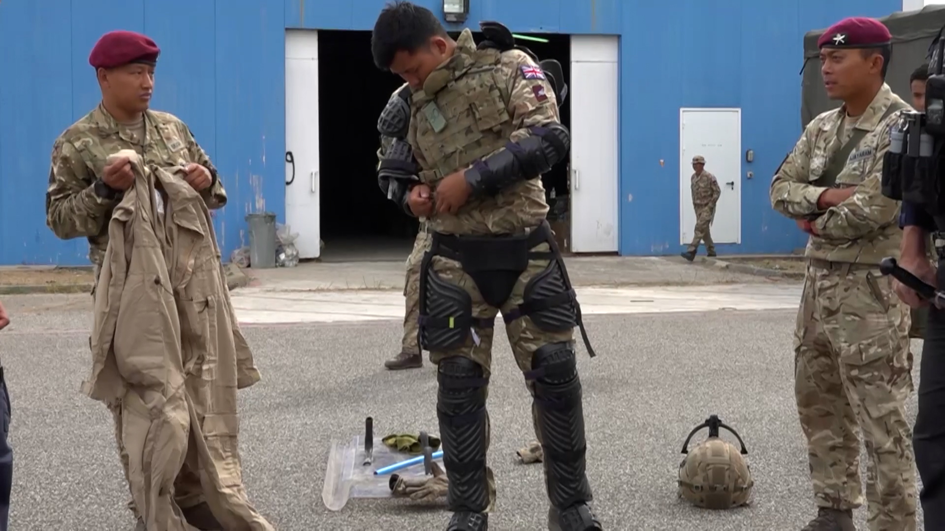 Soldiers from First Battalion Royal Gurkha Rifles in their public order equipment.