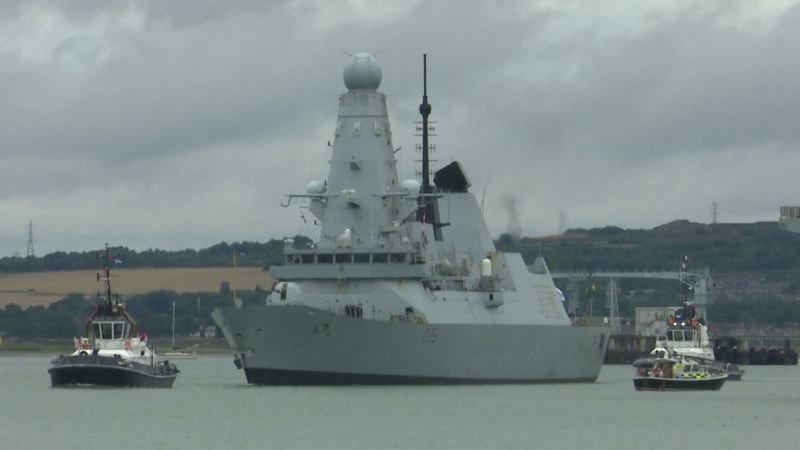 It's back to work for HMS Dauntless as she braves the grim weather and sets sail