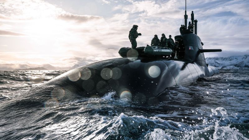 In pictures: Commandos hitch a ride on a submarine through the icy fjords of Norway