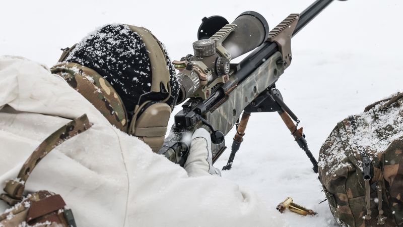 Snipers in the snow: Royal Marines practise their deadly craft on the range in Norway