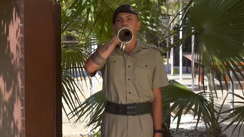 British soldiers keeping alive an 18th century military bugling tradition