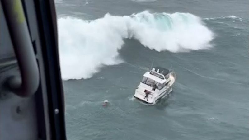 Washed Overboard Watch US coastguard rescue man thrown overboard by 20ft wave