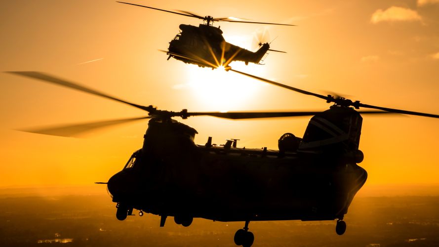 'Not Out' - Cpl Laurence. A formation flight of a Chinook and Puma to mark over 90 years of combined service 25112022 CREDIT MOD Crown Copyright 
