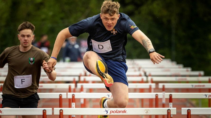 A soldier competes in the hurdles event during the Army Sport North Inter Unit Athletics Championships at Catterick Garrison