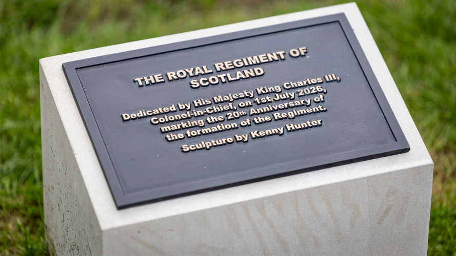 The monument, a bronze reclining lion guarding the regiment's cap badge, was designed by local Edinburgh artist, Kenny Hunter (Picture: British Army) The commemorative plaque of the monument which says that it was unveiled on July 1st and designed by Kenny Hunter