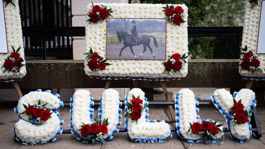 Floral tributes spell out "Sully", the name LBdr Sullivan was called by friends 