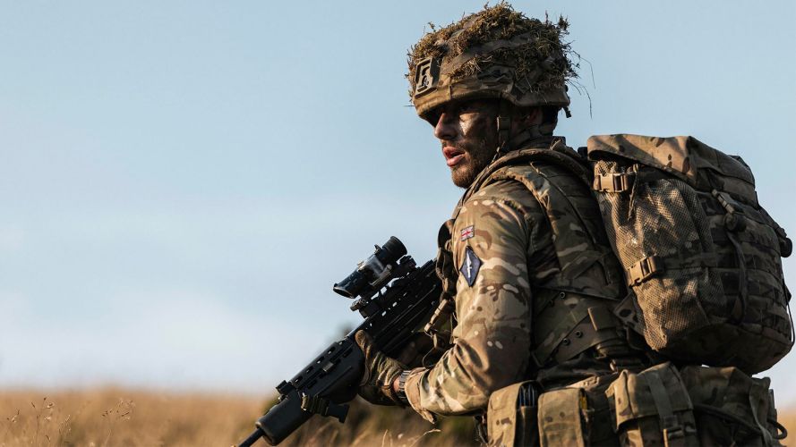 Lance Corporal Ashbee keeps a close eye on the members of his fire team during a section attack - a section is usually comprised of two fire teams, Charlie and Delta Lance Corporal Ashbee keeps a close eye on the members of his fire team during a section attack - a section is usually comprised of two fire teams, Charlie and Delta