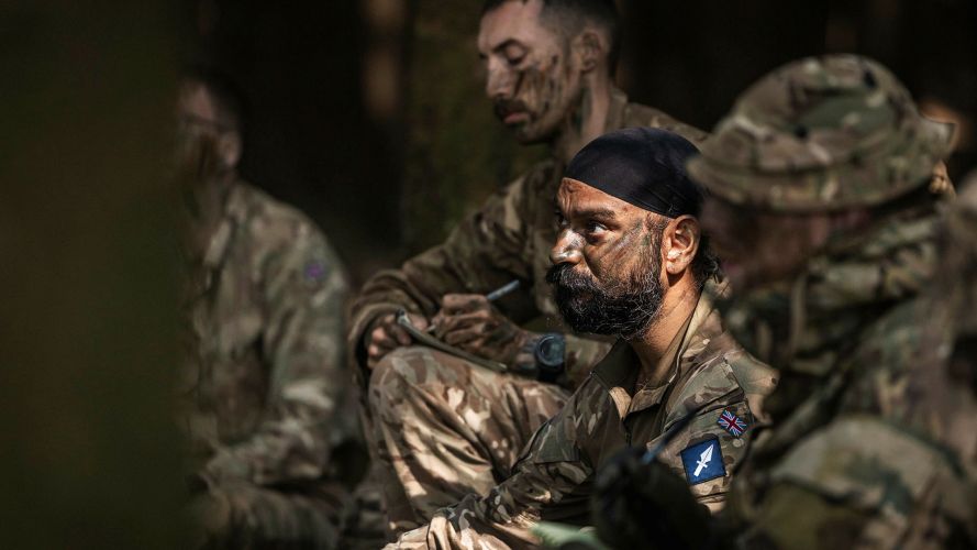 The signallers take notes as they attend an O Group the night before launching their deliberate attack on the enemy position - every little detail matters The signallers take notes as they attend an O Group the night before launching their deliberate attack on the enemy position - every little detail matters