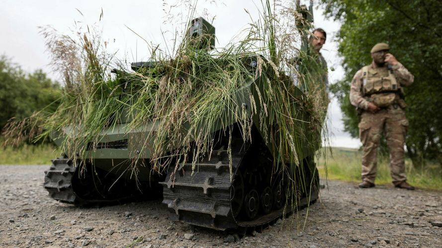 A Gereon uncrewed ground vehicle, an autonomous tracked utility vehicle used to observe targets, is demonstrated by soldiers from 1st Battalion, The Royal Anglian Regiment on Exercise Viking Strike