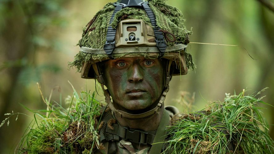 Private Bishop from 1st Battalion The Royal Anglian Regiment wears full camouflage and Tactical Engagement Simulation kit during Exercise Viking Strike on Otterburn training area in Northumberland