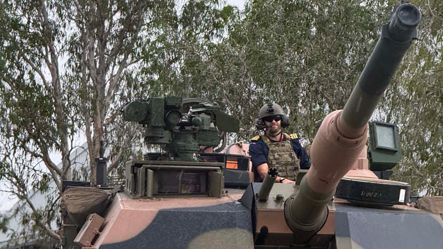 Tamars CO Cdr Thomas Lindsey enjoys the view from the turret