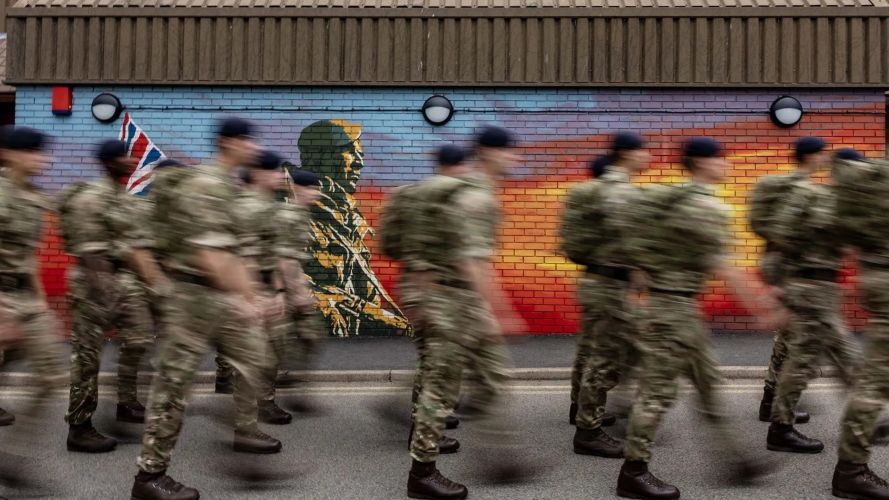 07082025 Royal Marine Troop march past Falklands Yomper Mural at the Commando Training Centre in Lympstone, Devon CREDIT Royal Navy