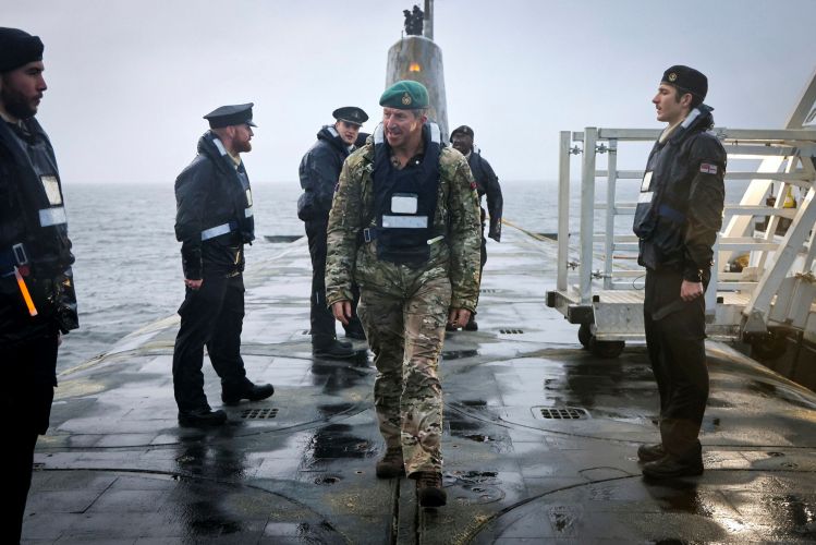 First Sea Lord General Sir Gwyn Jenkins went aboard to personally welcome the submariners home