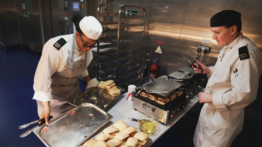 The forward galley has been transformed into a so-called 'grazing galley', serving food continuously from 09:00 to 18:00 HMS Queen Elizabeth is trialling Generational change to feeding (GenChange) and all-day grazing pic MOD