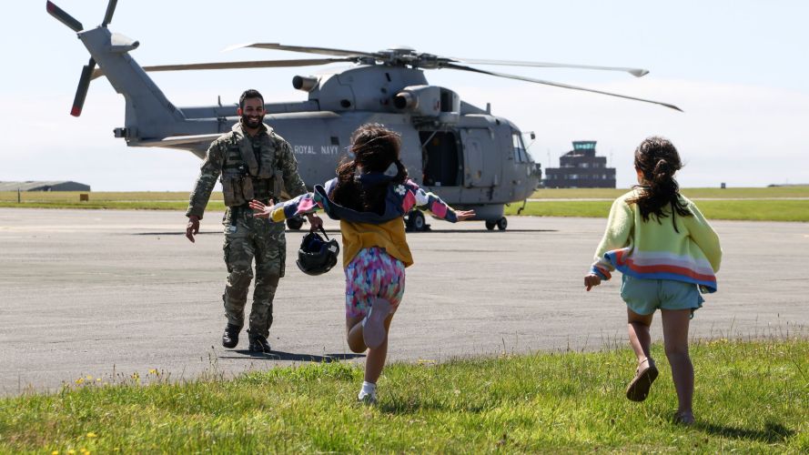 Children run to their father who has just returned from an air defence mission in Cyprus (Picture: MOD) Children run to their father who has just returned from an air defence mission in Cyprus (Picture: MOD)