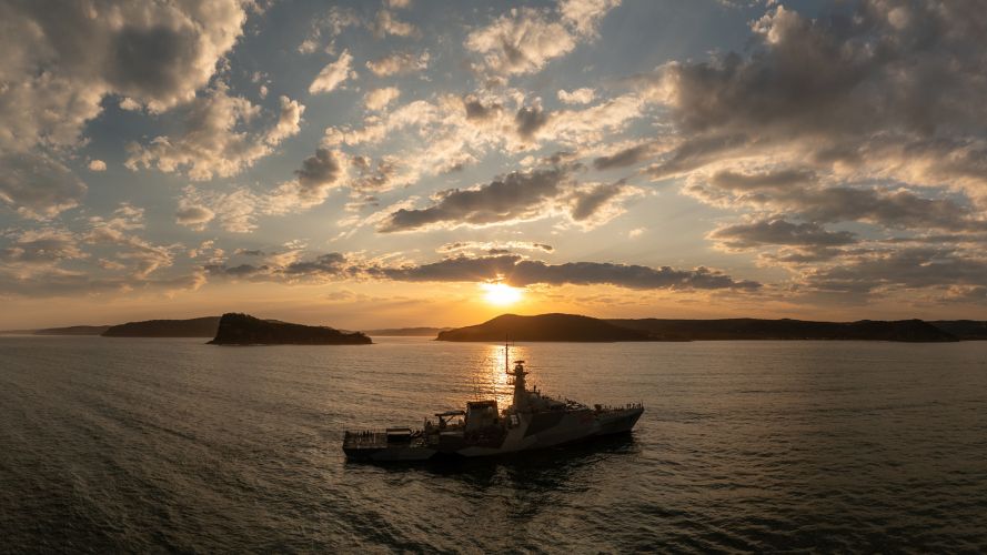 HMS Tamar sails during a sunset off the Australian coast (Picture: Royal Navy)