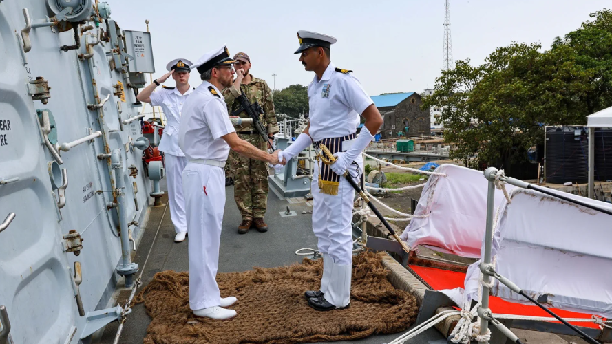 08102025 Commander Rich Kemp greets Lieutenant Harshvardhan Sharma of the Indian Navy CREDIT ROYAL NAVY