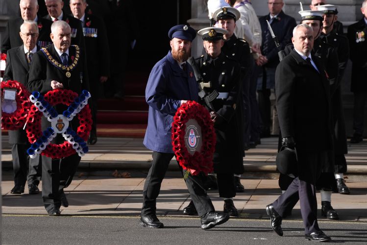 Armed forces wreath bearers arrive on Whitehall during the Remembrance Sunday service at the Cenotaph in London (Picture: PA) 09112025 Armed forces wreath bearers arrive on Whitehall during the Remembrance Sunday service at the Cenotaph in London