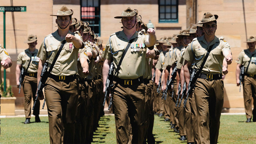 Members of the Royal Australian Corps of Signals march on parade during the Royal Australian Corps of Signals centenary parade at Victoria Barracks in Sydney