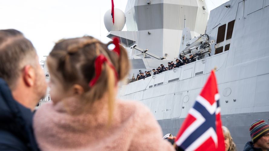Personnel stand onboard the vessel after she returned home (Picture: Edward Valentin Coates/Forsvaret) Personnel stand onboard the vessel after she returned home
