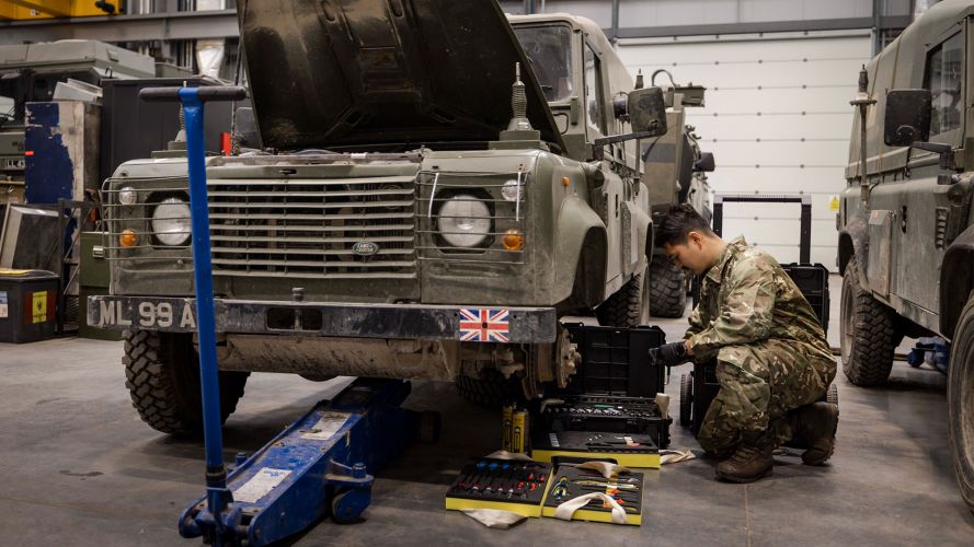 A lance corporal from the King's Royal Hussars Light Aid Detachment uses the new Vehicle Maintenance Kit on a Land Rover at Tidworth - the new kit is significantly more comprehensive and is also more portable