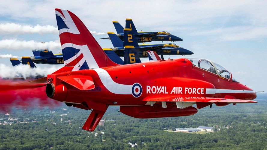 The iconic red Hawk T1 jets performed a mixed formation flypasts in Maine with their US Navy counterparts