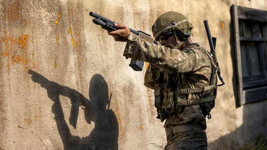 A soldier from 2nd Battalion, The Parachute Regiment carries out a live fire exercise to counter drone threats using a Mossberg 590M shotgun
