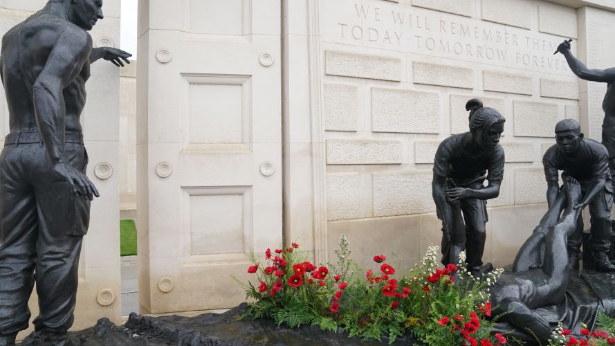 Poppies adorn the Armed Forces Memorial at the National Memorial Arboretum in Alrewas, Staffordshire