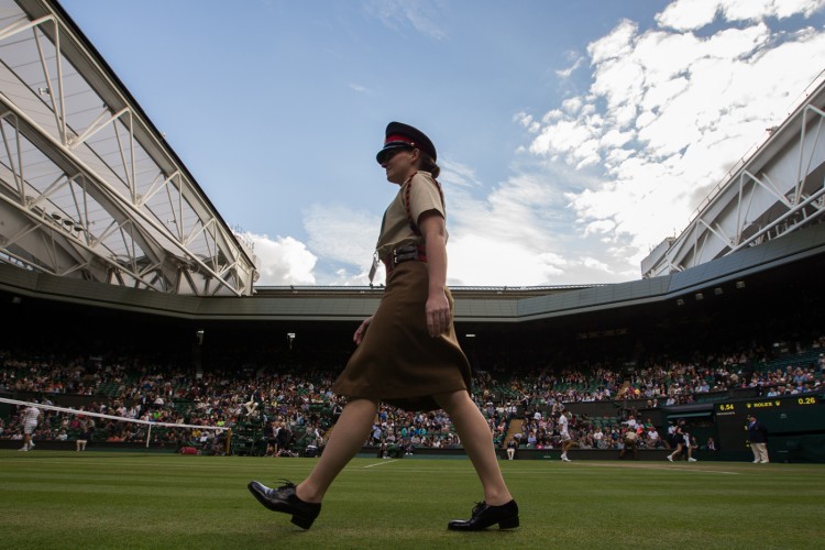 Private Richards leaves Centre Court to monitor for court intrusion between games