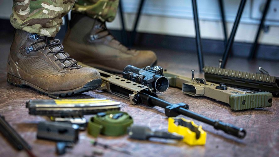 An SA80 L85A2 from the Scottish and North Ireland Yeomanry is stripped down for cleaning - the rifle also gets stripped down as part of the Weapon Handling Test, which must be renewed every six months