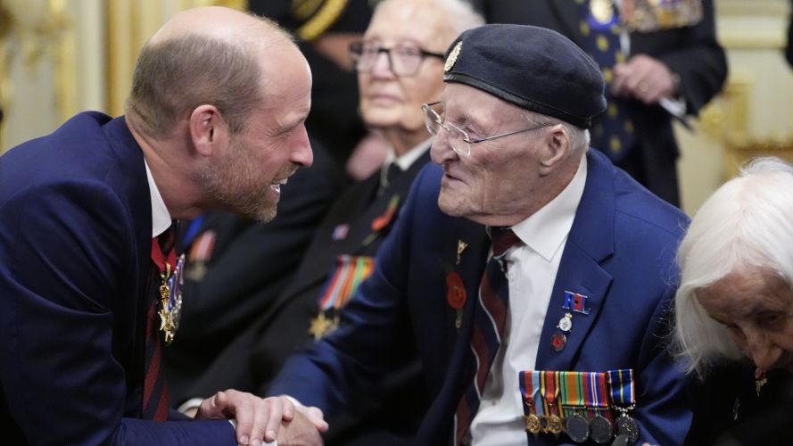 Prince of Wales and veteran Ron Gumbley at a commemorative event marking 80th anniversary of VJ Day 