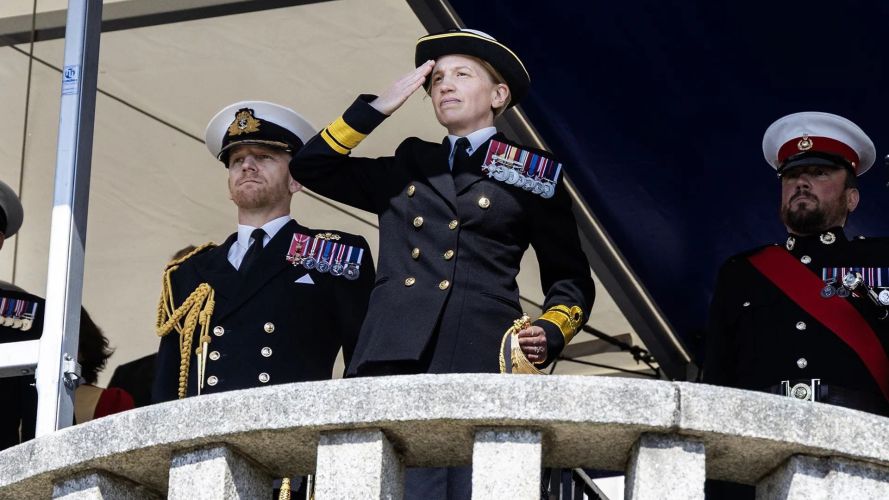 Rear Adm Singleton acknowledges the cadets who are passing out from the Dartmouth dais (Picture: Royal Navy) Rear Adm Singleton acknowledges the passing out cadets from the Dartmouth dais (Picture: Royal Navy)