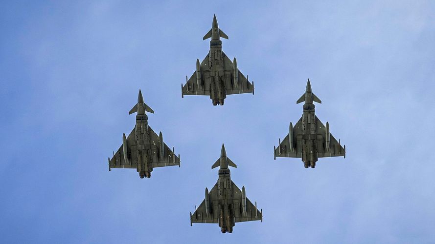 Four Typhoons fly in formation over Buckingham Palace and The Mall at the end of the King's Birthday Parade, better known as Trooping the Colour