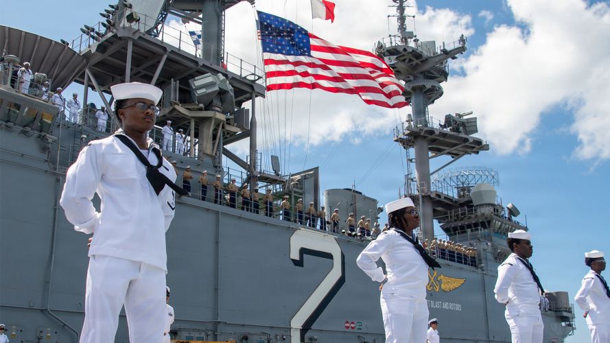 Sailors and marines aboard the amphibious assault ship USS Essex man the rails after arriving at Pearl Harbor in Hawaii for Rim of the Pacific 2026 Sailors and marines aboard the amphibious assault ship USS Essex man the rails after arriving at Pearl Harbor in Hawaii for Rim of the Pacific 2026