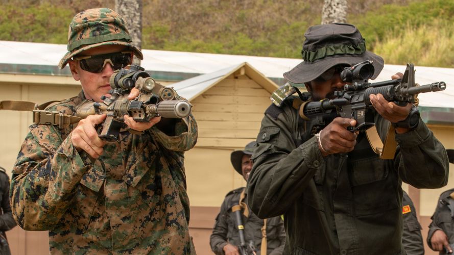 US and Indonesian marines conduct close-quarters battle tactics at a live-fire range event at Marine Corps Base Hawaii US and Indonesian marines conduct close-quarters battle tactics at a live-fire range event at Marine Corps Base Hawaii